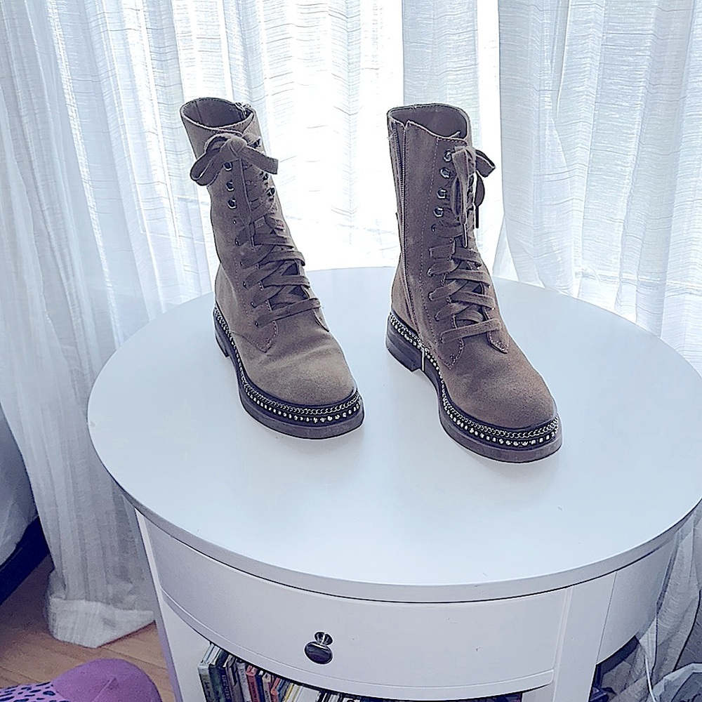 Suede rhinestone and chain detailed booties.